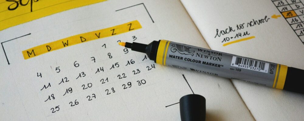 black marker on notebook